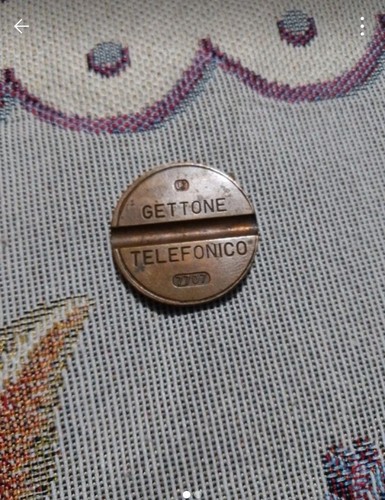 Gettone telefonico 7707 - telefonico, ut