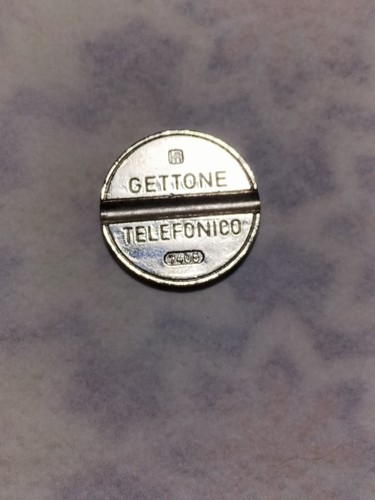 Gettone telefonico 7405 - telefonico, colore